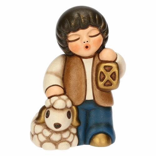 Thun Bimbo con lanterna in ceramica Presepe Classico - T10383280A98