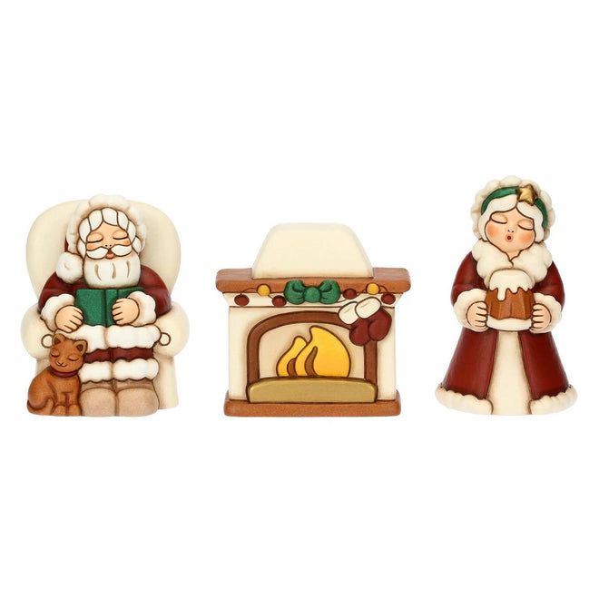 Thun Babbo e mamma Natale con camino in ceramica - T10441305A91