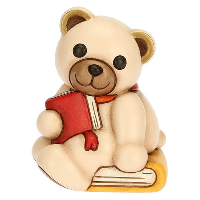 Thun Teddy con libro in ceramica - F3386H90 - Gioielleria De Patto